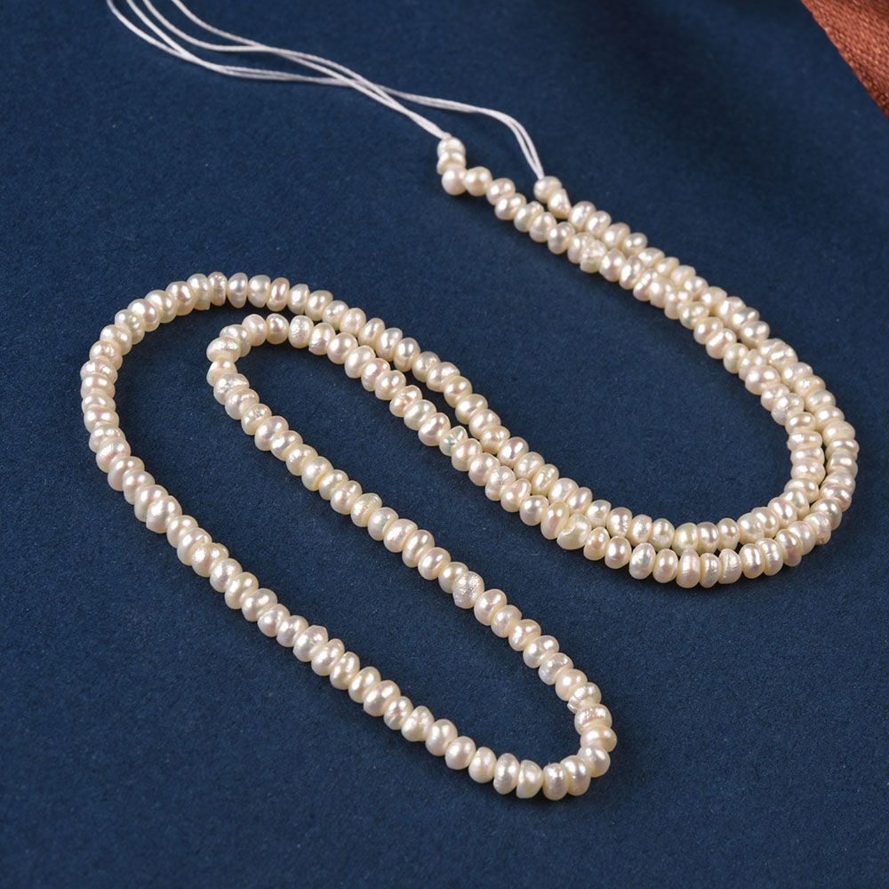 White Button Freshwater Pearl Strands